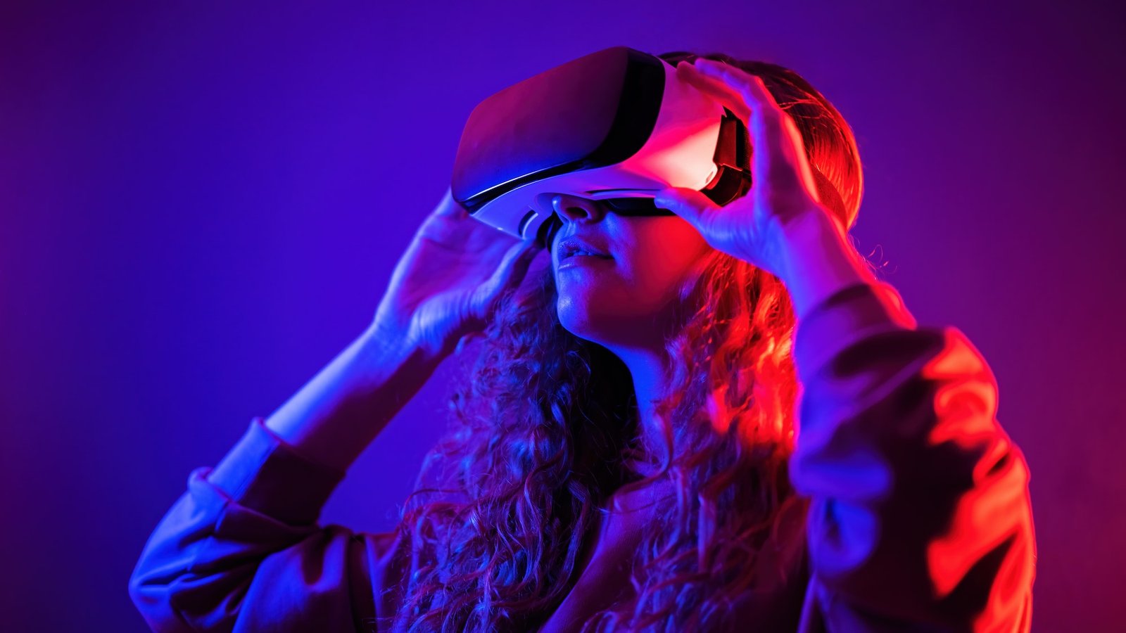 Young girl in virtual reality glasses at home